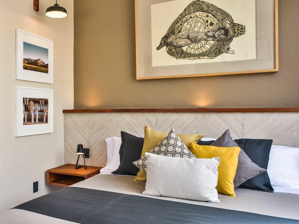 Hotel Criol Querétaro Εξωτερικό φωτογραφία A bedroom at the hotel